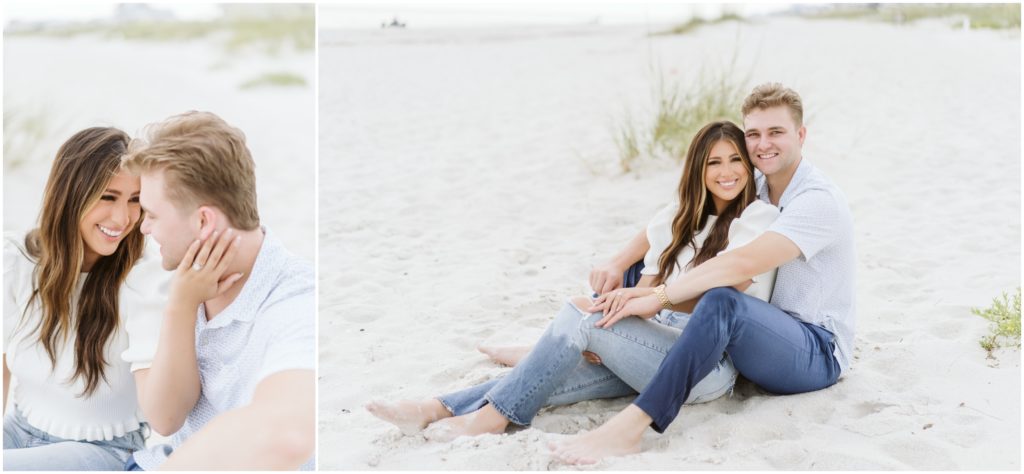 Engaged couple cuddled on the beach at Camp Helen on 30A